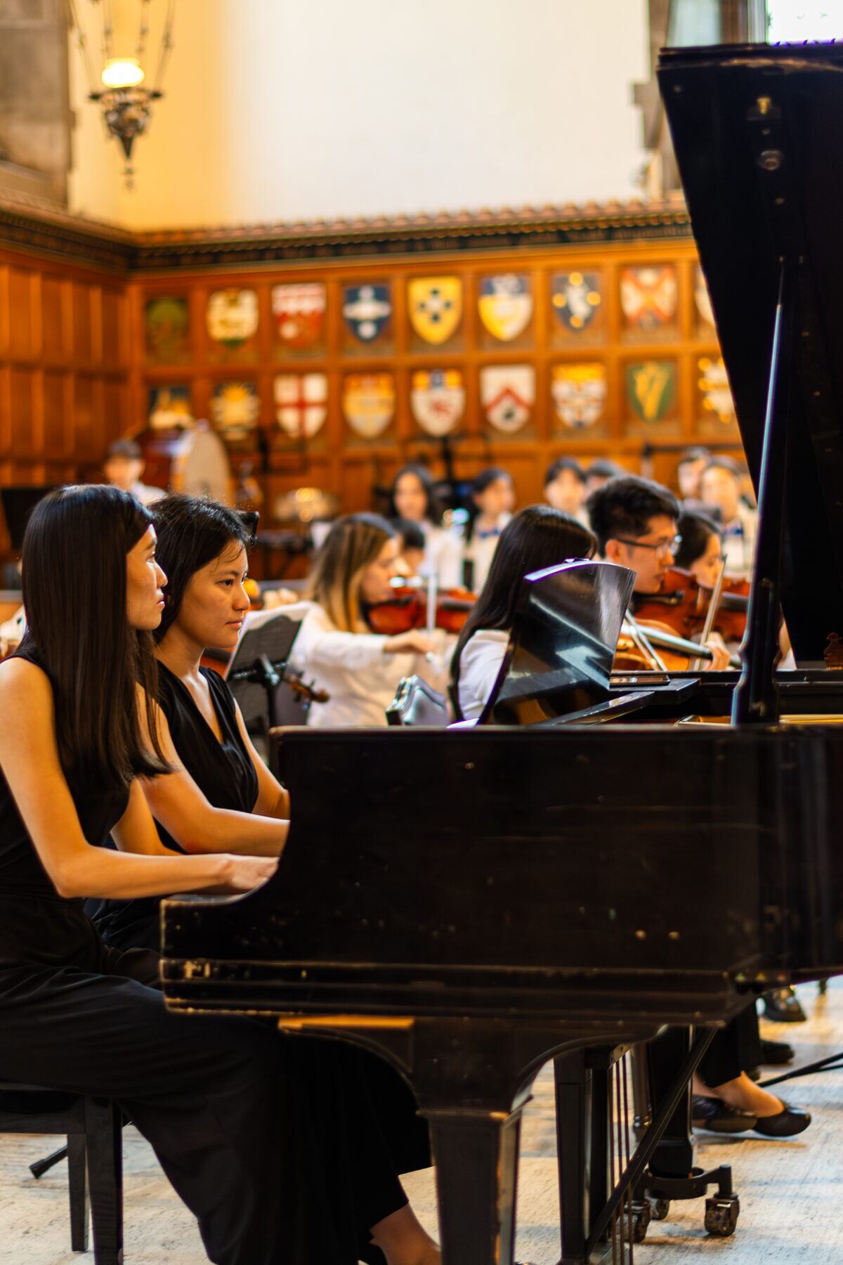 Pianists performing with the Toronto Pops Orchestra at Hart House