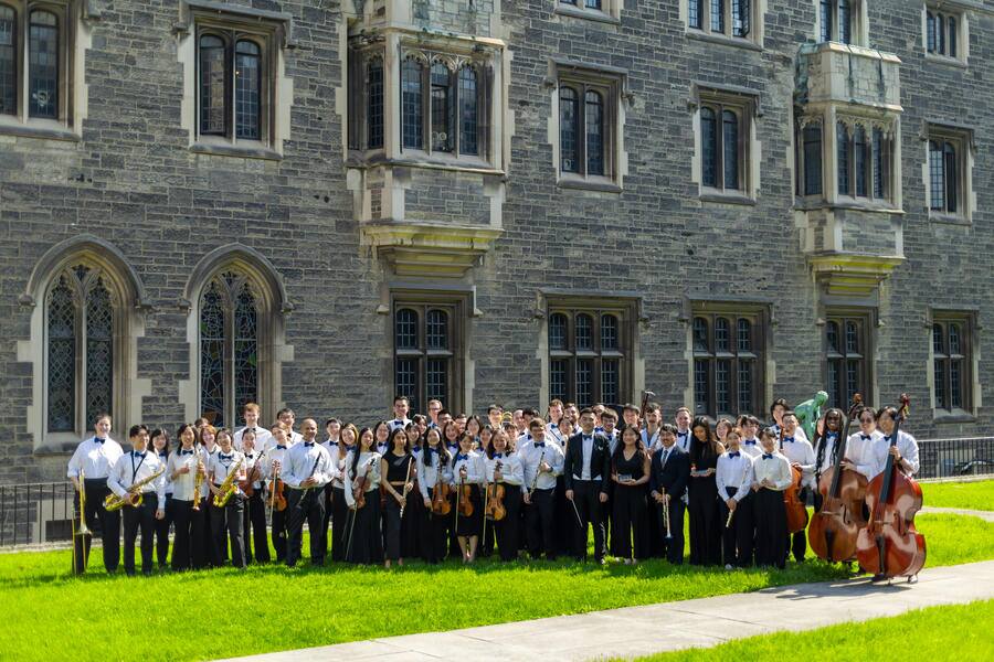 The orchestra gathered outside Hart House